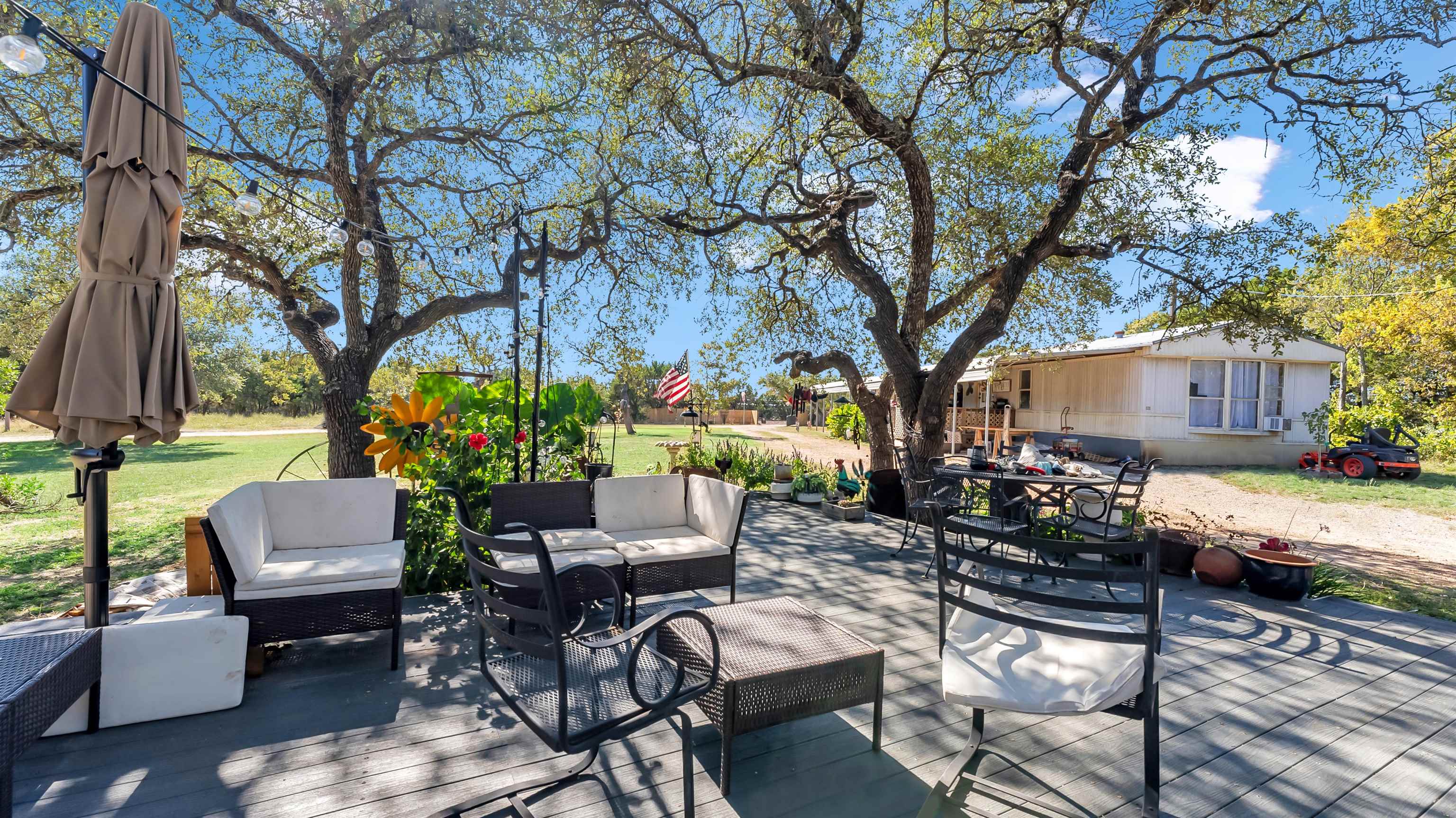 5128 West 29th Highway Bertram, TX 78605 - Photo 21 of 28 a view of a patio with a yard