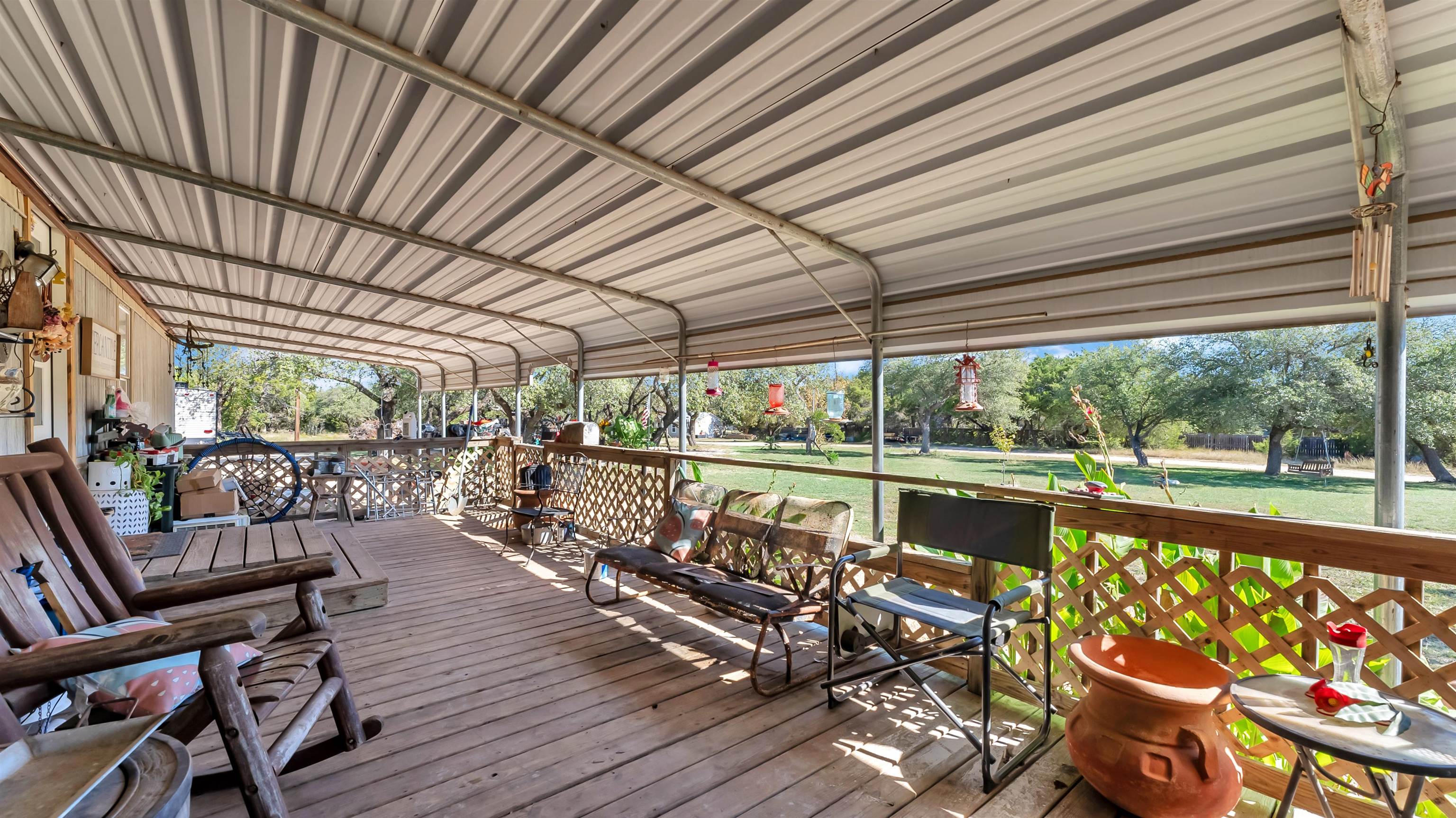 5128 West 29th Highway Bertram, TX 78605 - Photo 6 of 28 a view of a chairs and table in the balcony