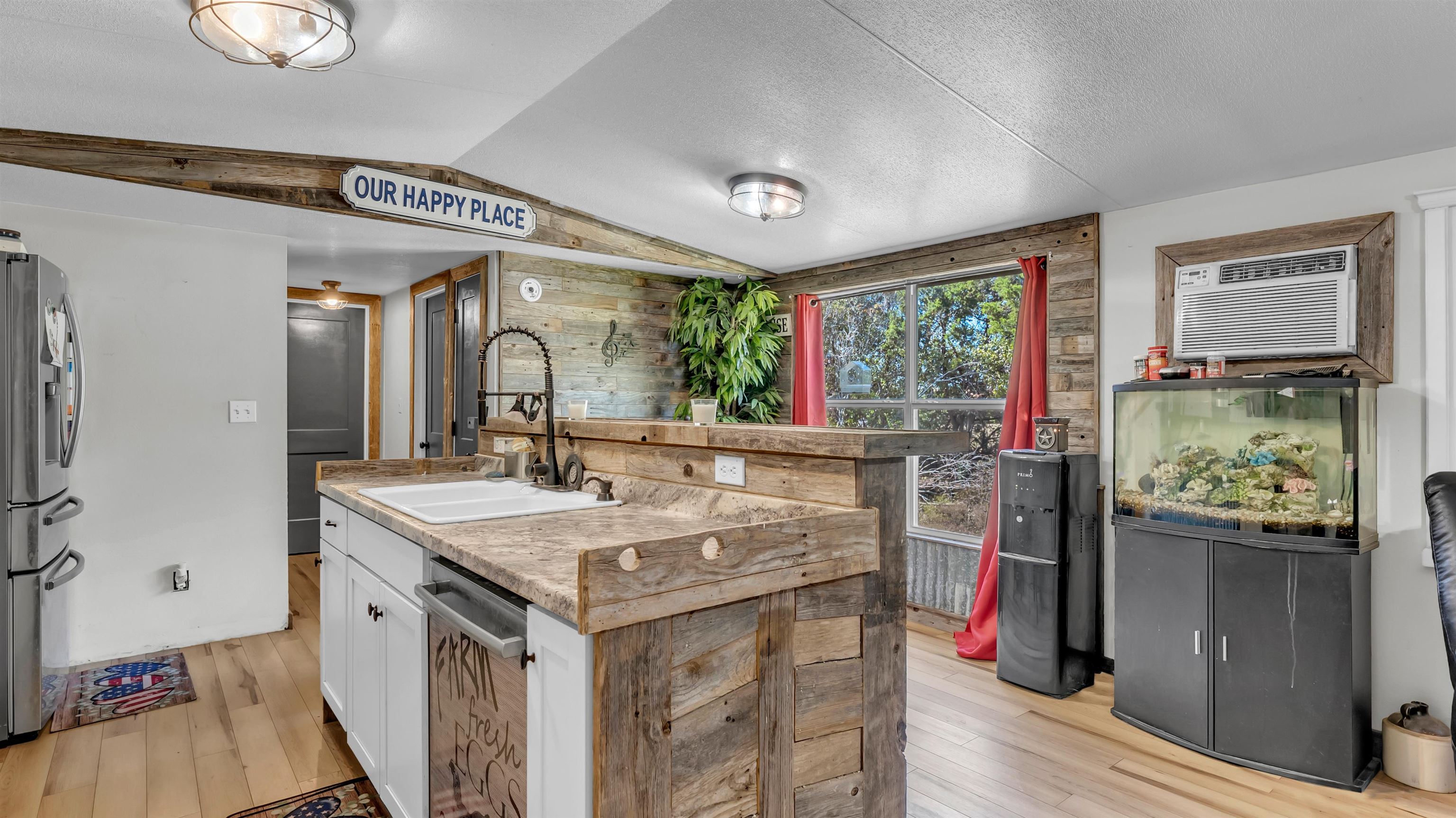 5128 West 29th Highway Bertram, TX 78605 - Photo 8 of 28 a view of living room with granite countertop furniture and fireplace