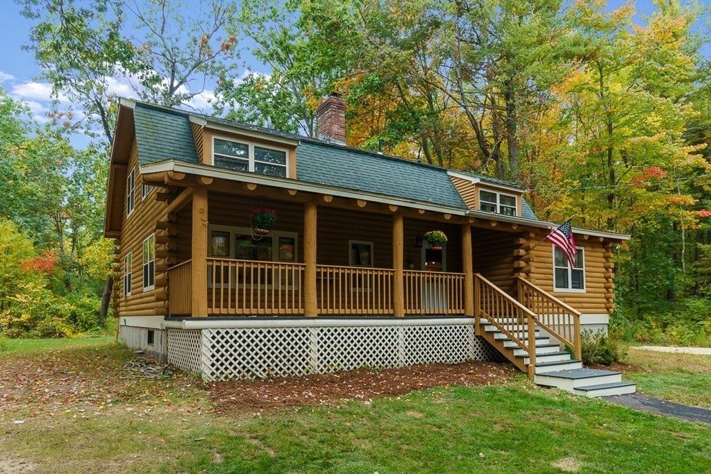 51 Gilchrist Road Townsend, MA 01469 - Photo 39 of 42 a front view of a house with a yard