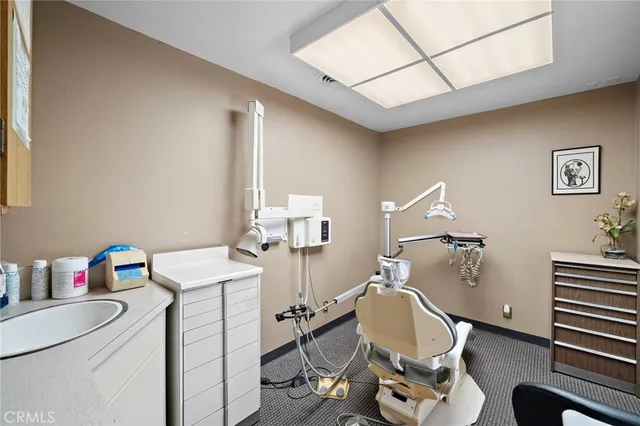 a room with furniture and a wooden floor