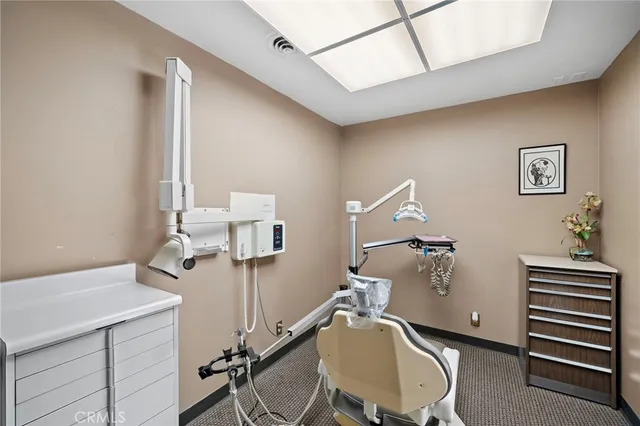 a room with furniture and wooden floor