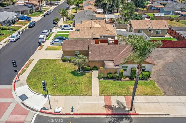 a view of a swimming pool with a yard