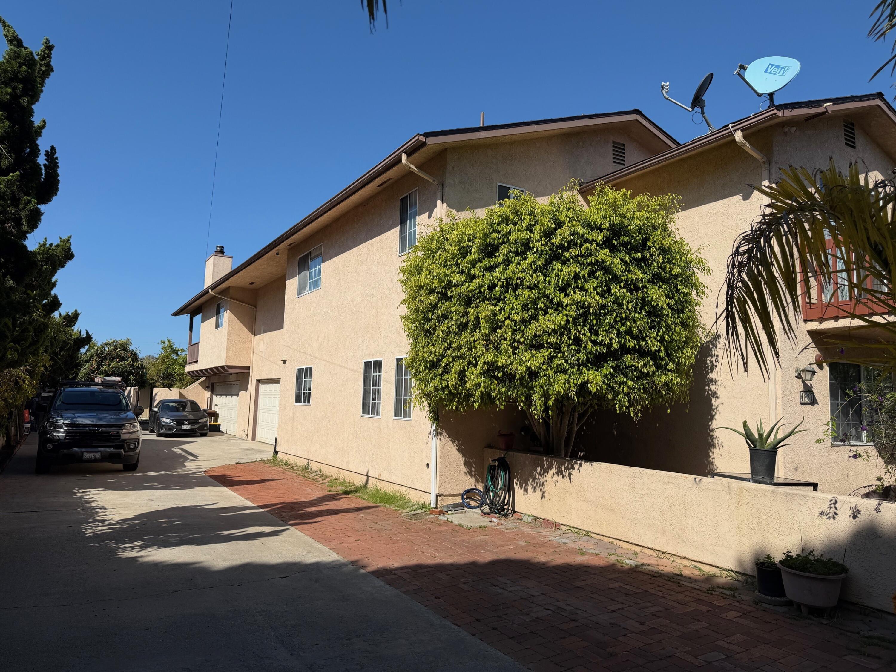 4837 7th Street Carpinteria, CA 93013 - Photo 3 of 3 a front view of a house with a yard