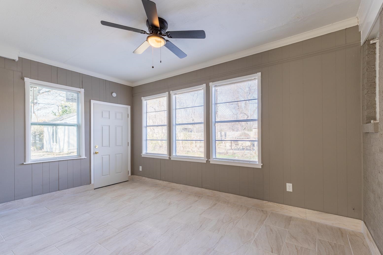 1511 Raymore Road Memphis, TN 38117 - Photo 18 of 21 a view of an empty room with a window