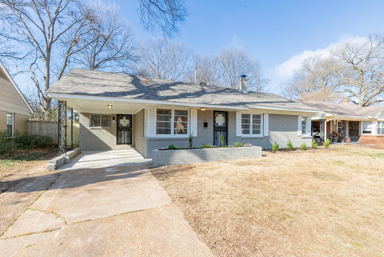 1511 Raymore Road Memphis, TN 38117 - Photo 2 of 21 a view of a house with a patio