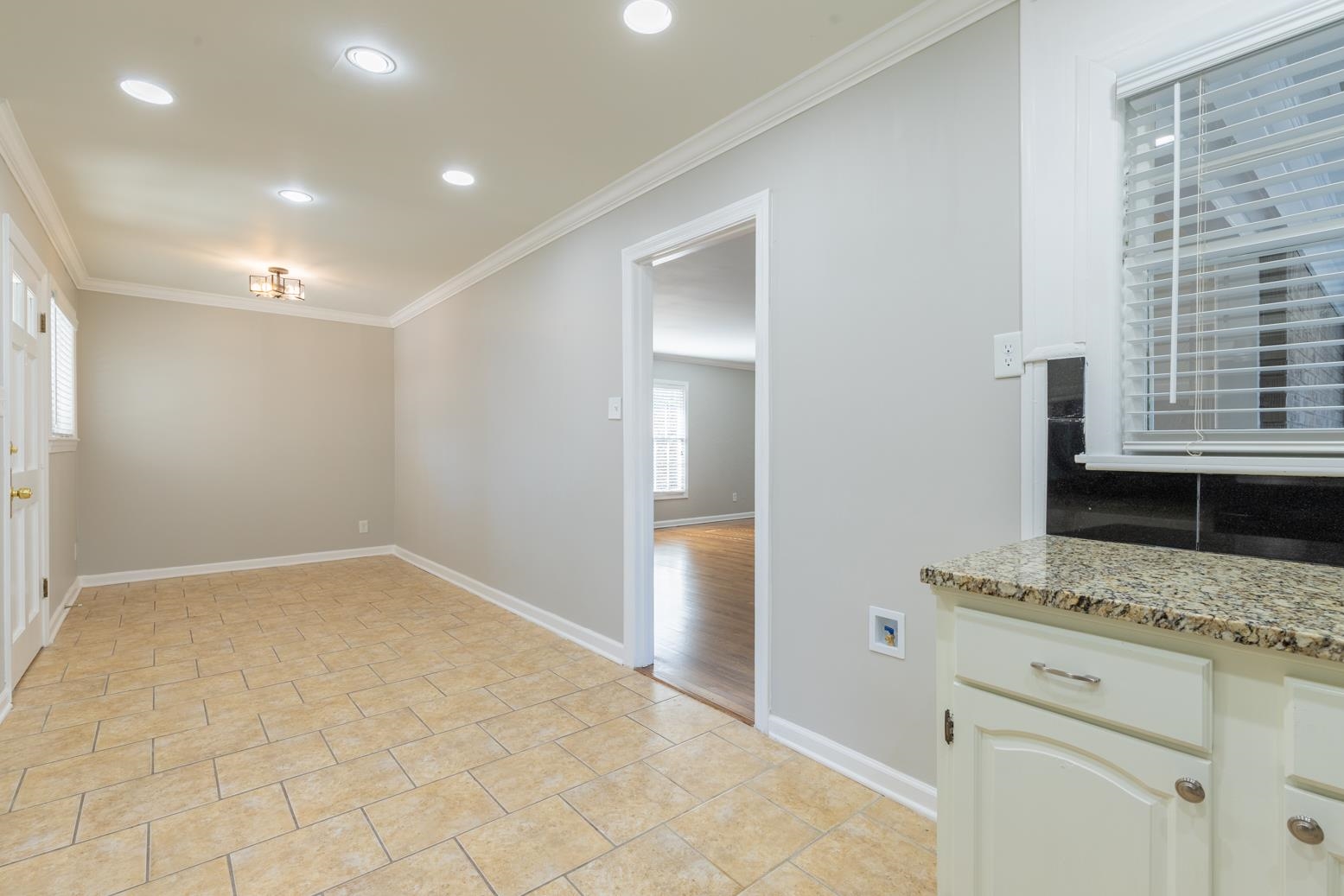 1511 Raymore Road Memphis, TN 38117 - Photo 10 of 21 a view of kitchen and utility room