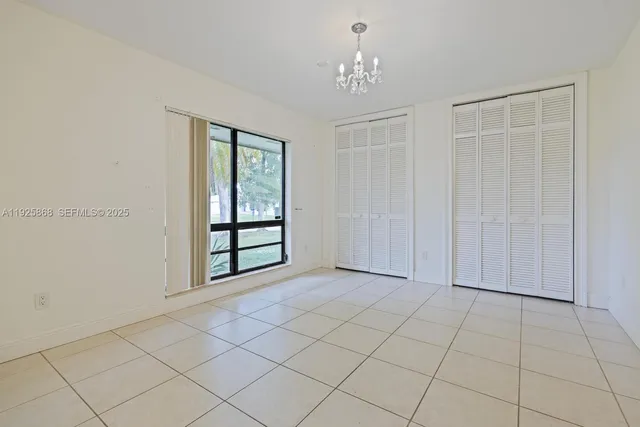 a utility room with a sink a washer and dryer