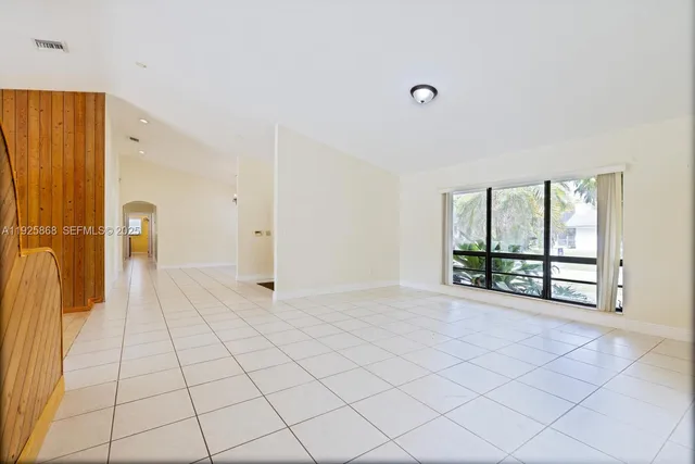 a view of an empty room with window