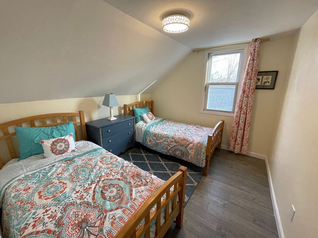 8 Pike Street Hopkinton, MA 01748 - Photo 14 of 34 a bedroom with two beds and a dresser