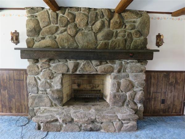 56 Ely Road Monson, MA 01057 - Photo 8 of 15 a room with a fireplace