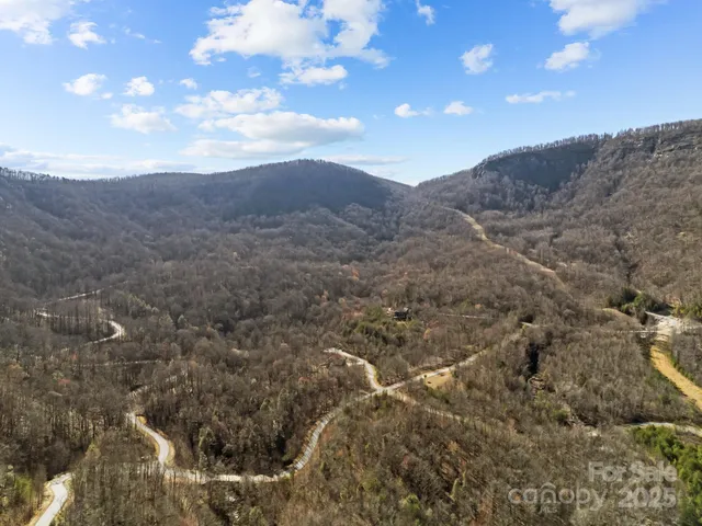 a view of mountain view with lots of trees