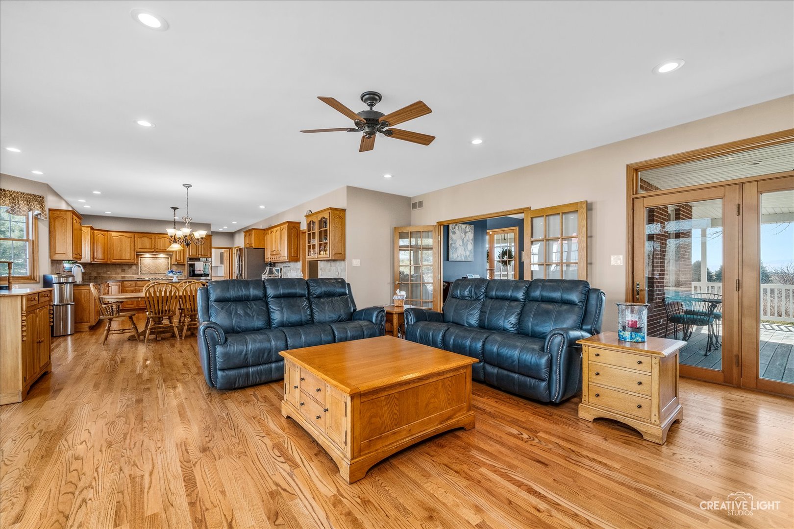1651 Johnson Road Oswego, IL 60543 - Photo 9 of 60 a living room with furniture and kitchen view