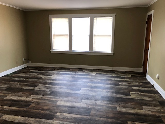 3311-3315 Waukegan Road McHenry, IL 60050 - Photo 12 of 16 a view of empty room with window and wooden floor