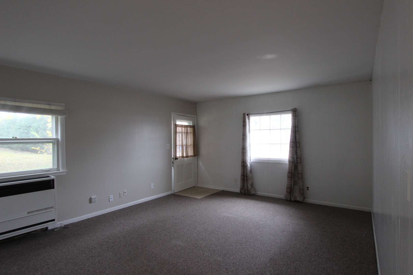 3311-3315 Waukegan Road McHenry, IL 60050 - Photo 2 of 16 an empty room with windows