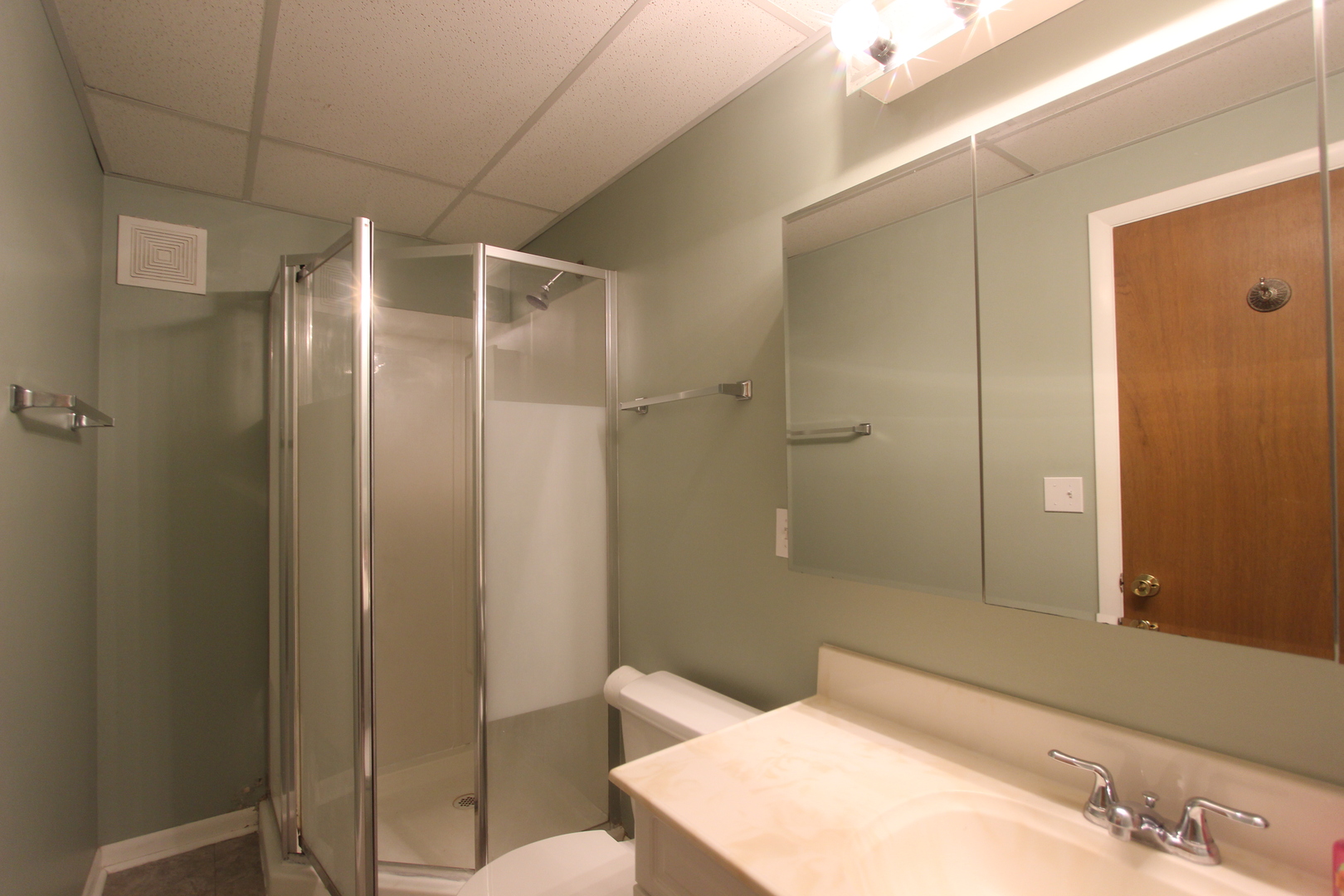 3311-3315 Waukegan Road McHenry, IL 60050 - Photo 6 of 16 a bathroom with a shower and a toilet