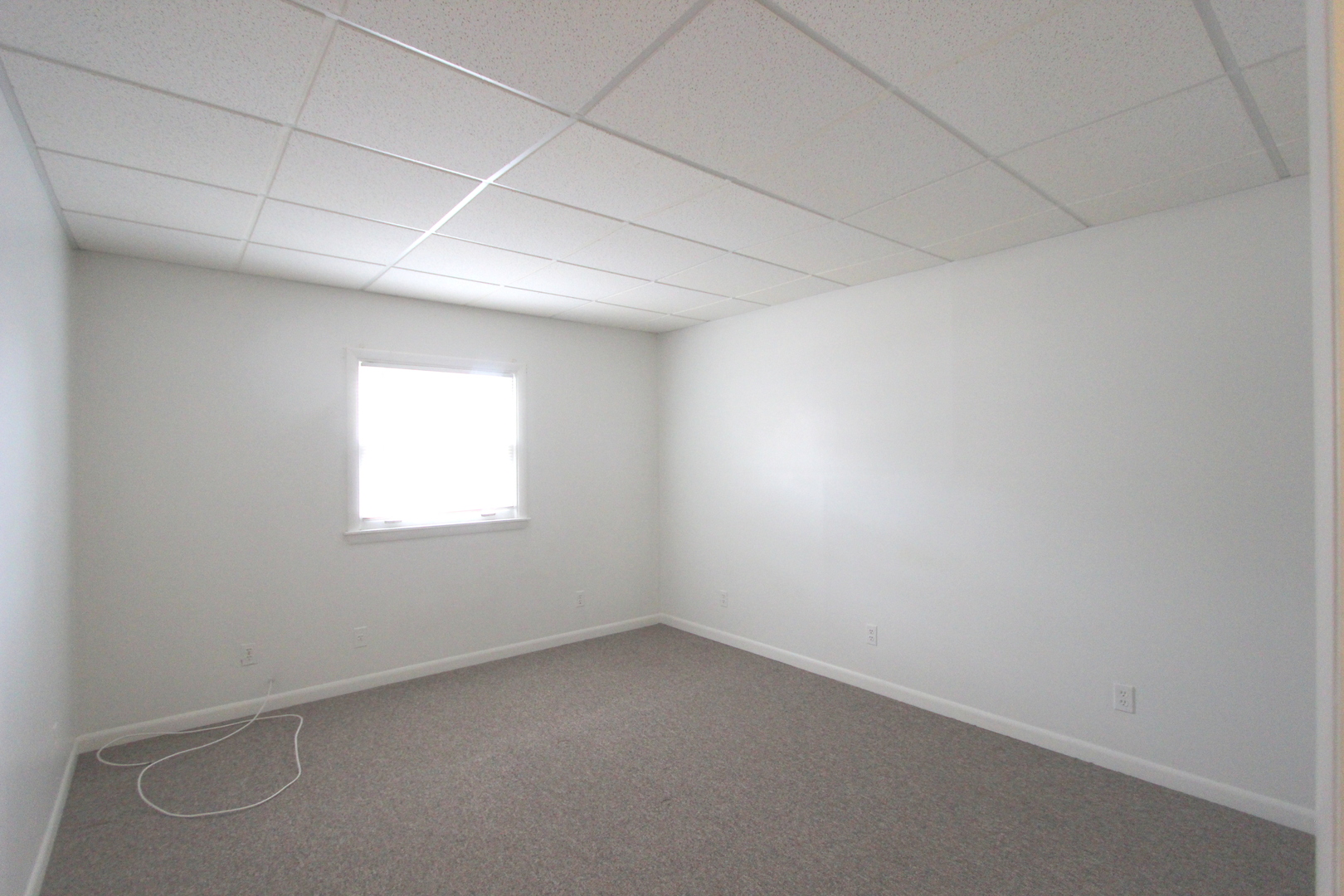 3311-3315 Waukegan Road McHenry, IL 60050 - Photo 7 of 16 an empty room with a window