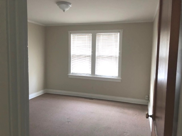 3311-3315 Waukegan Road McHenry, IL 60050 - Photo 9 of 16 an empty room with windows