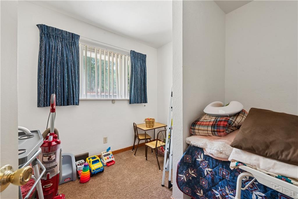 2122 Elizabeth Court Export, PA 15632 - Photo 24 of 35 a room with toys and a wooden floor