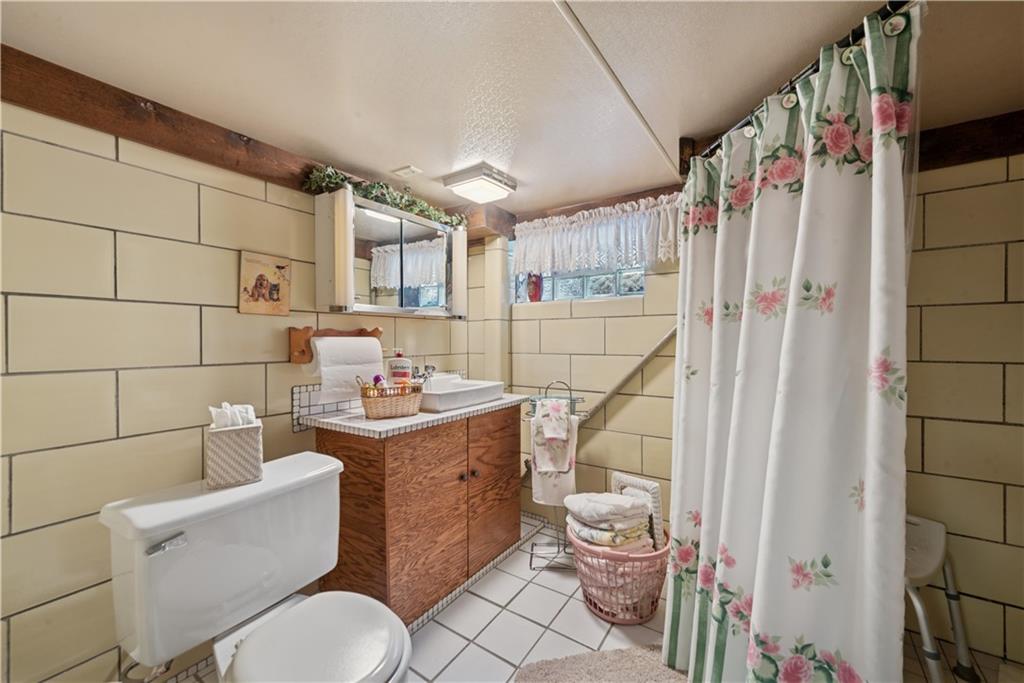 2122 Elizabeth Court Export, PA 15632 - Photo 25 of 35 a bathroom with a sink toilet and shower