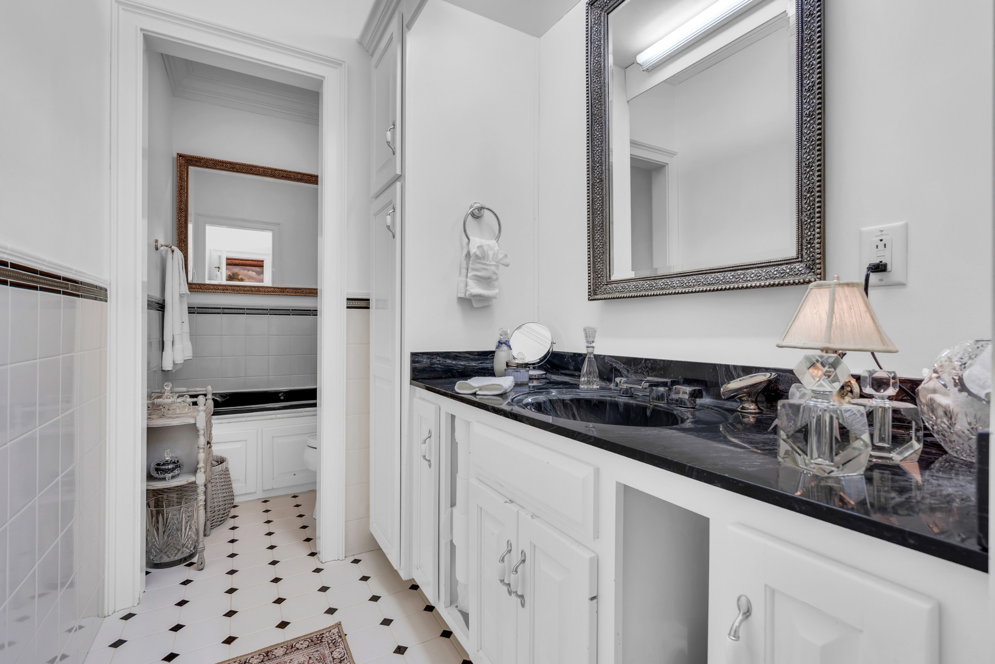 515 Cox Hollow Road Dover, TN 37058 - Photo 31 of 57 a kitchen with stainless steel appliances a sink and a stove with white cabinets