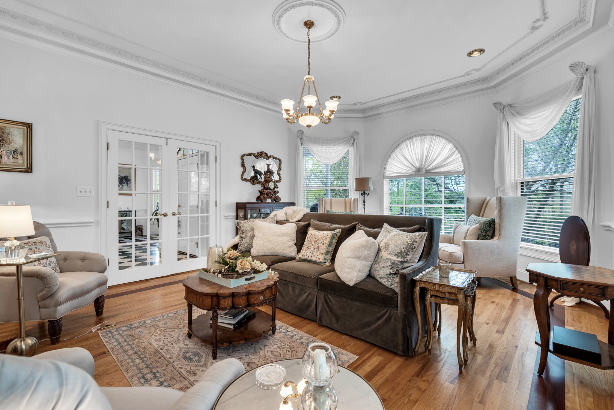 515 Cox Hollow Road Dover, TN 37058 - Photo 38 of 57 a living room with furniture chandelier and a large window