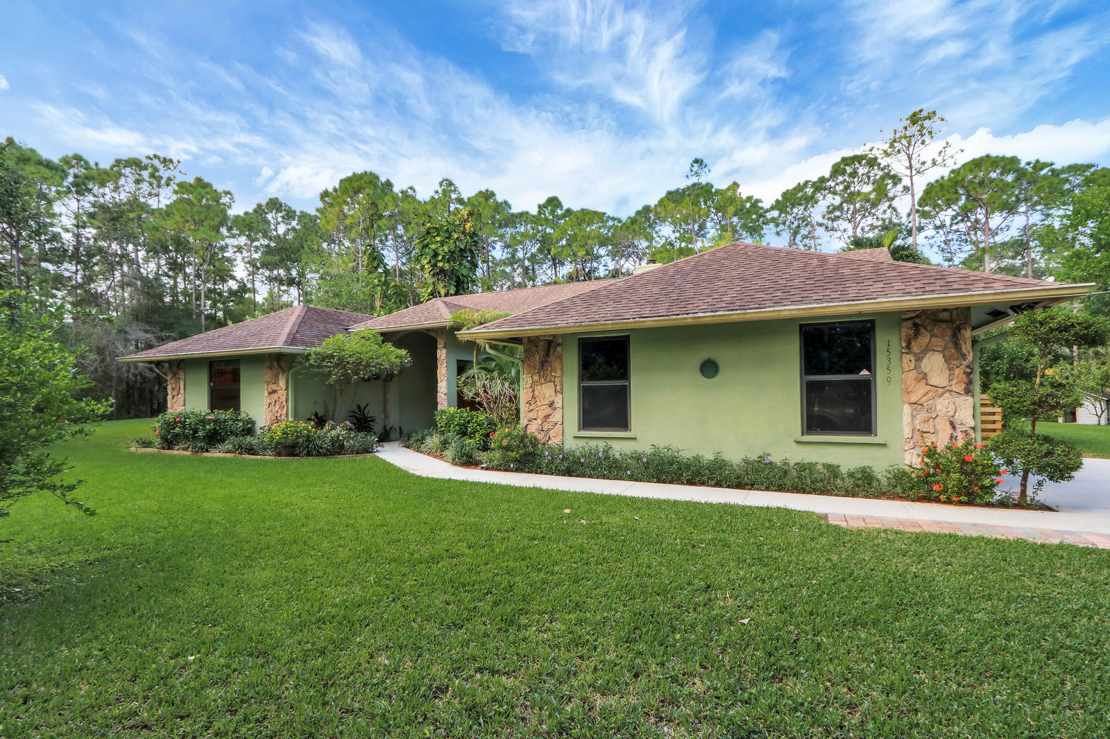 15359 Alexander Run Jupiter, FL 33478 - Photo 35 of 39 sidewalk to entrance