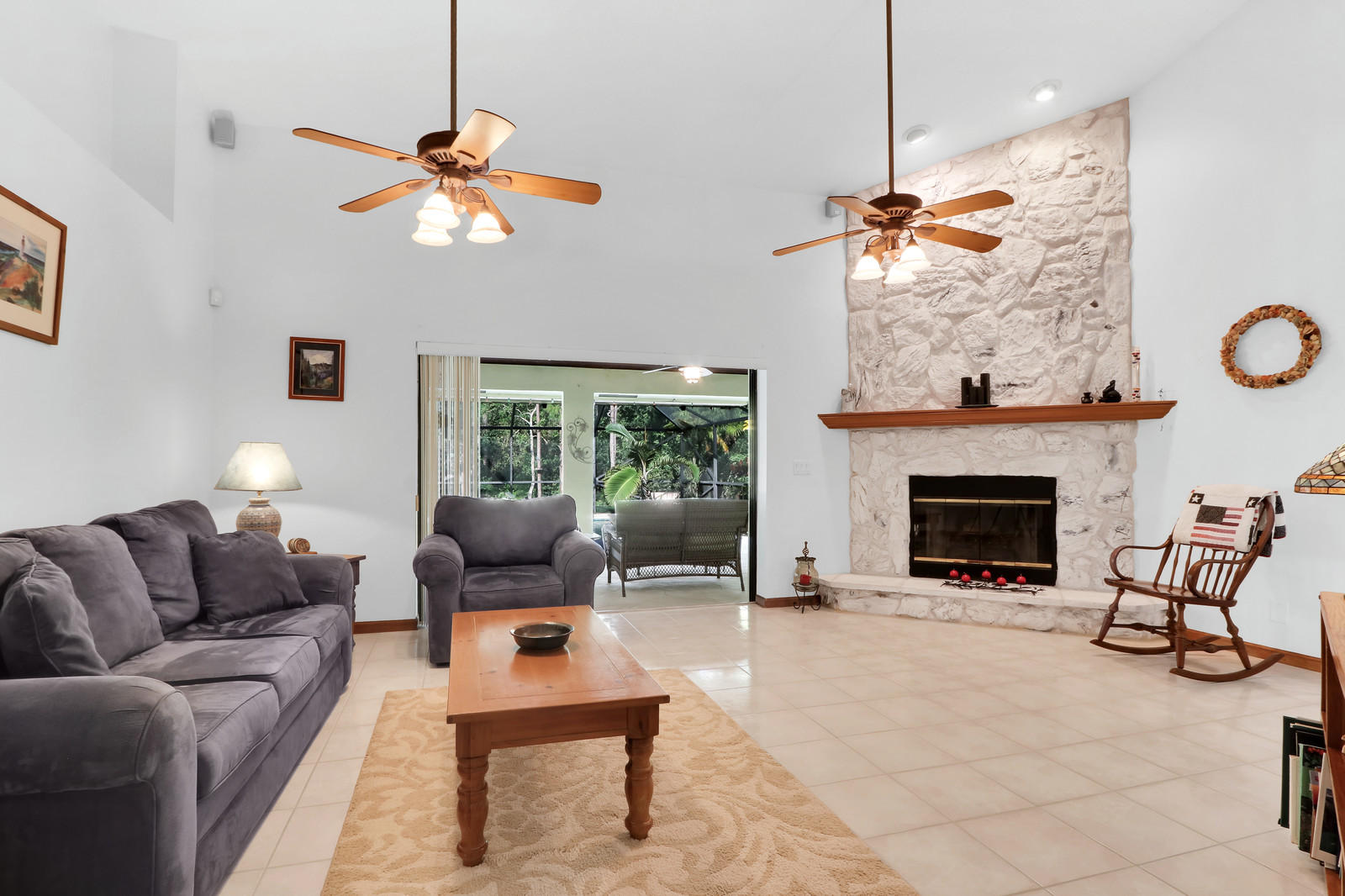 15359 Alexander Run Jupiter, FL 33478 - Photo 5 of 39 living room with triple sliders