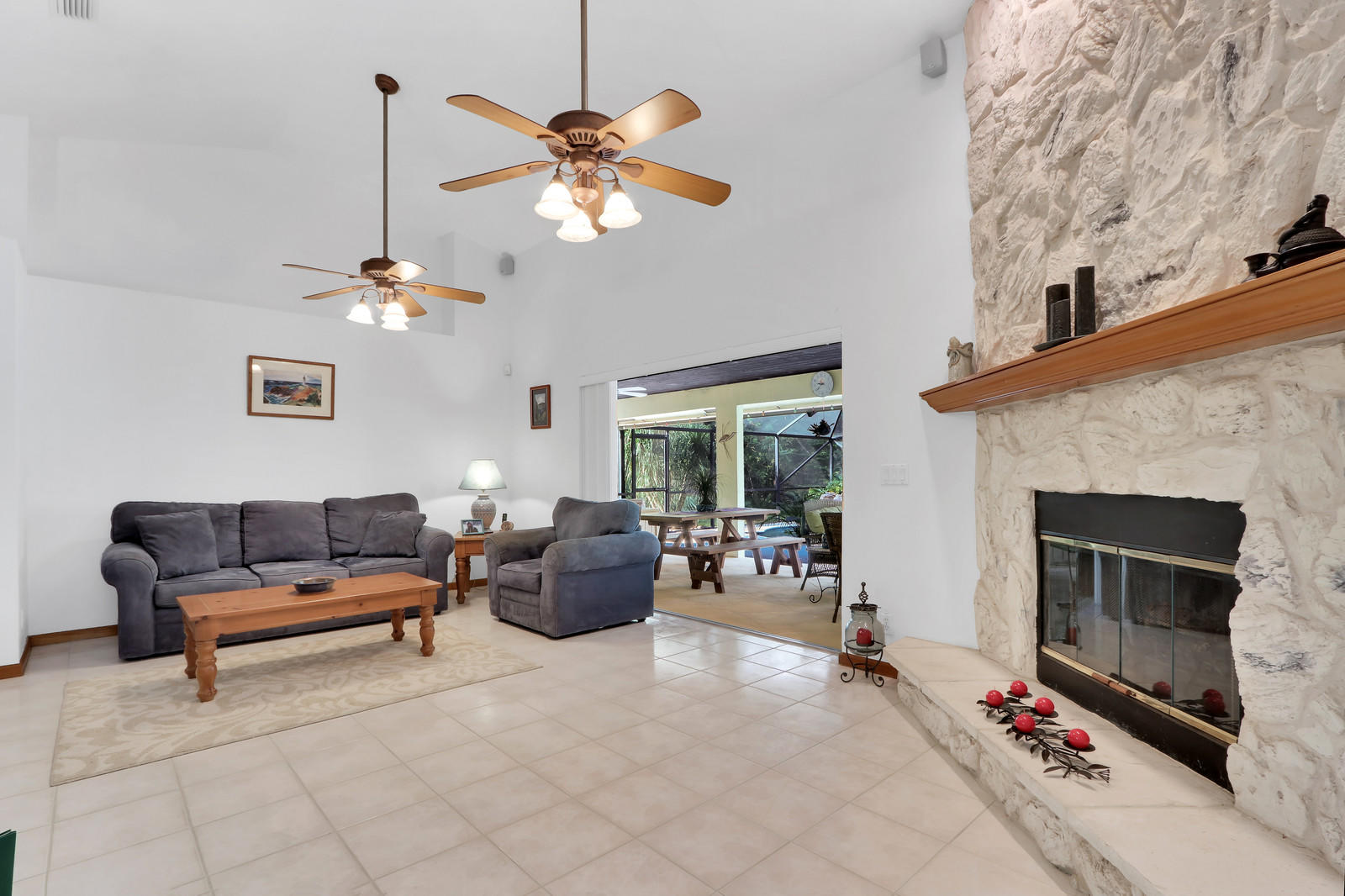 15359 Alexander Run Jupiter, FL 33478 - Photo 6 of 39 stone wood burning fireplace