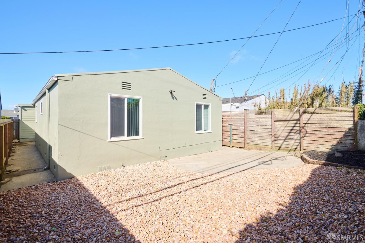 92 Oceanside Drive Daly City, CA 94015 - Photo 16 of 17 a view of a terrace with wooden walls