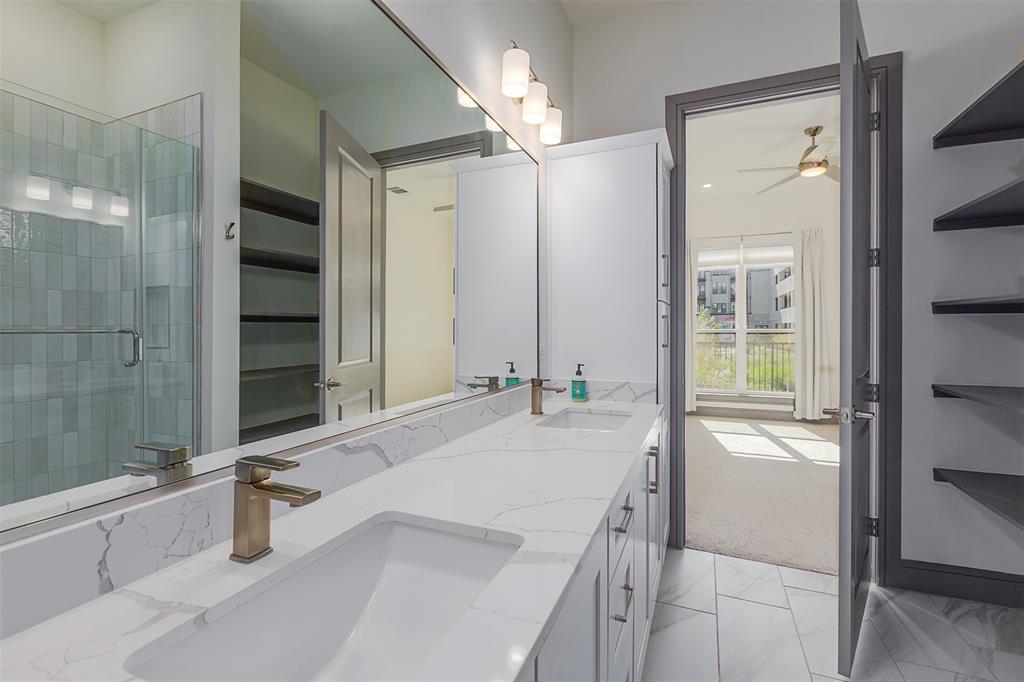 2700 Old Denton Road, Unit 1044 Carrollton, TX 75007 - Photo 12 of 33 Dual vanity with undermount sinks and veined stone countertops