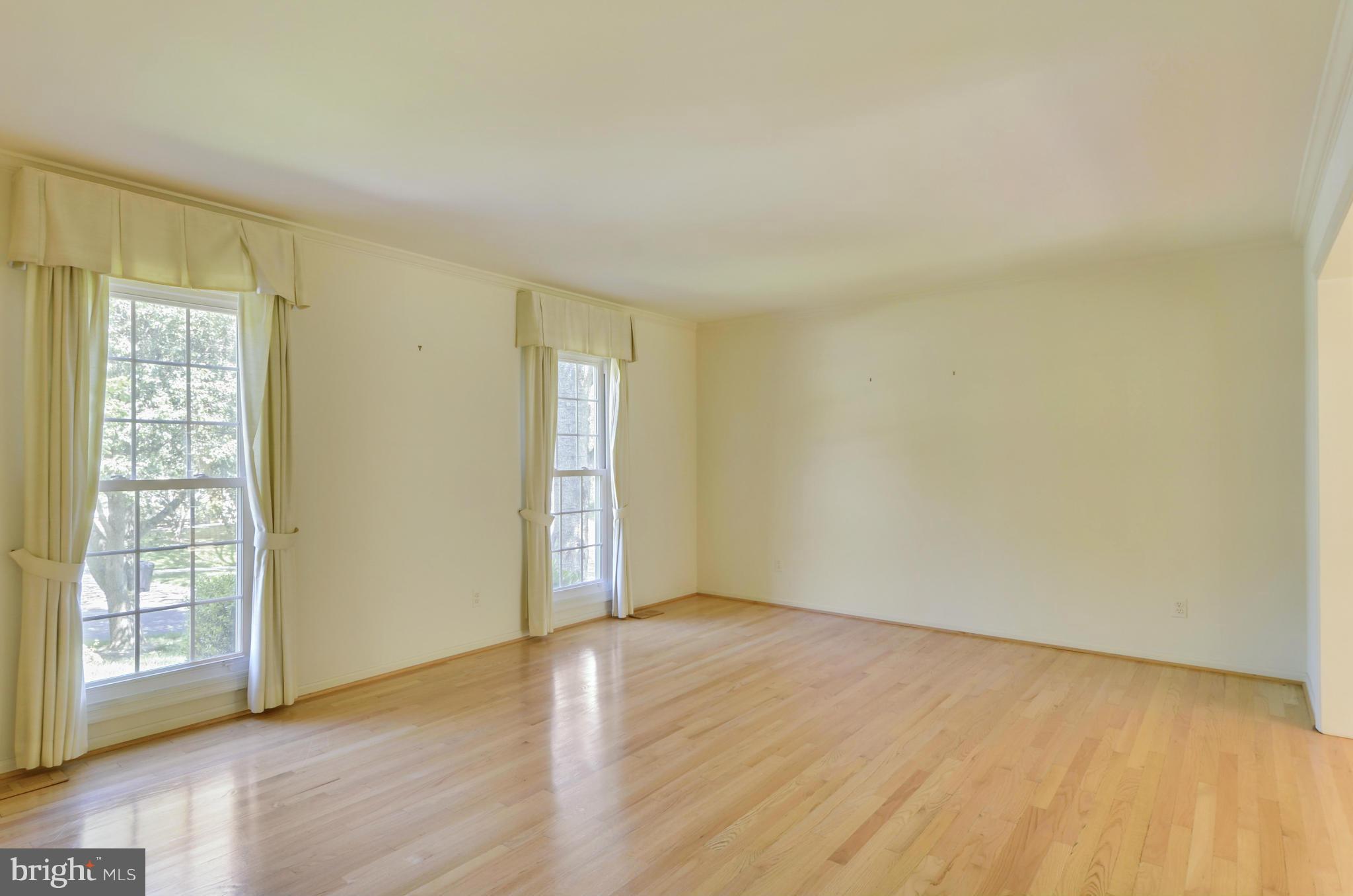 12119 Triple Crown Road North Potomac, MD 20878 - Photo 4 of 30 Living Room has gleaming hardwood floor