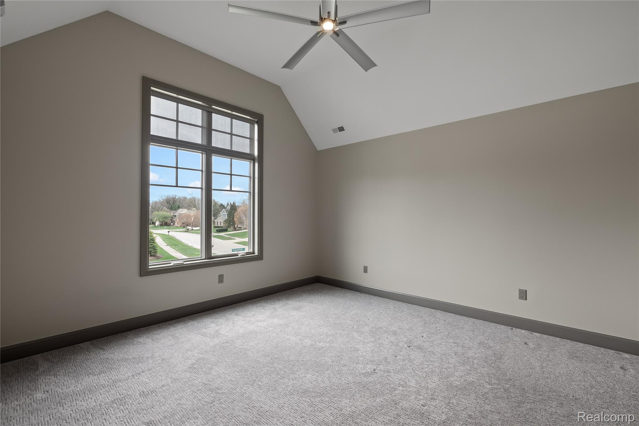 3824 Poppleton Street Troy, MI 48084 - Photo 26 of 51 Additional living space with ceiling fan and light carpet