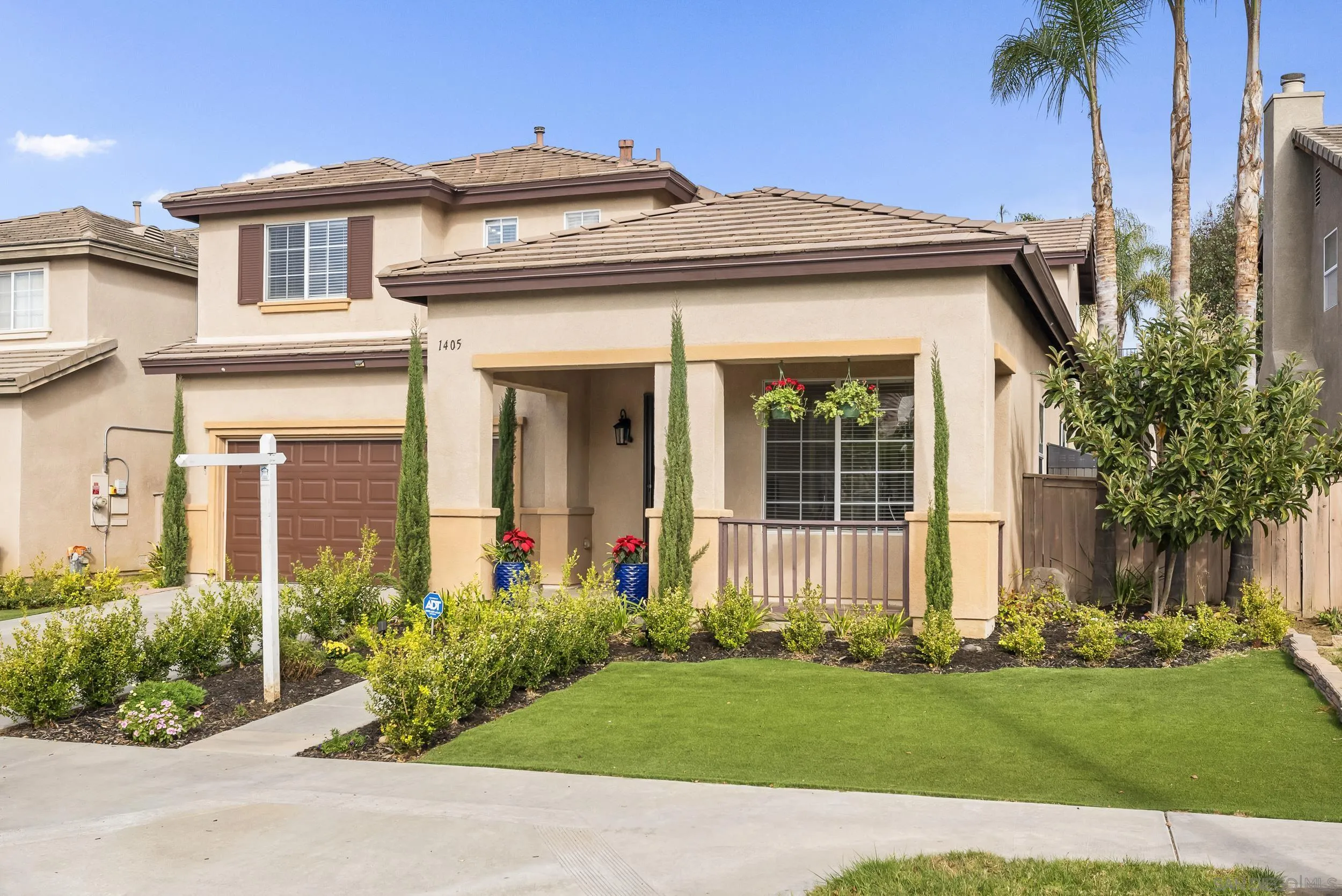 1405 Carneros Valley Street Chula Vista, CA 91913 - Photo 2 of 45 a front view of a house with a yard