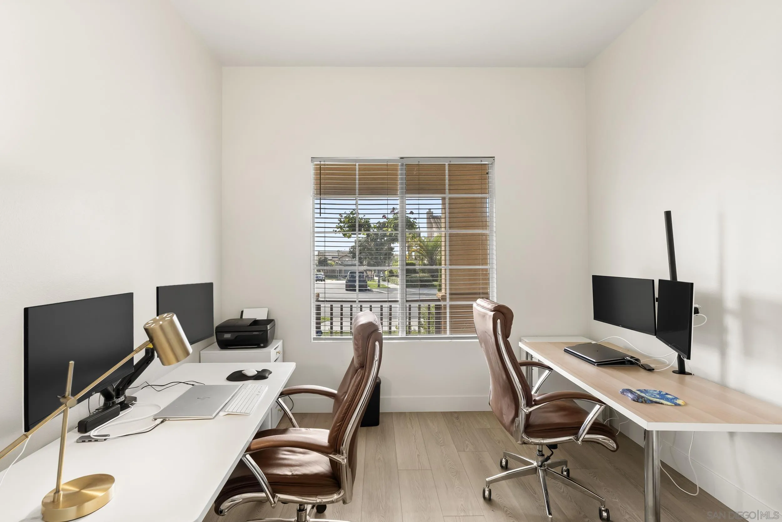 1405 Carneros Valley Street Chula Vista, CA 91913 - Photo 21 of 45 a view of a workspace with furniture and a window