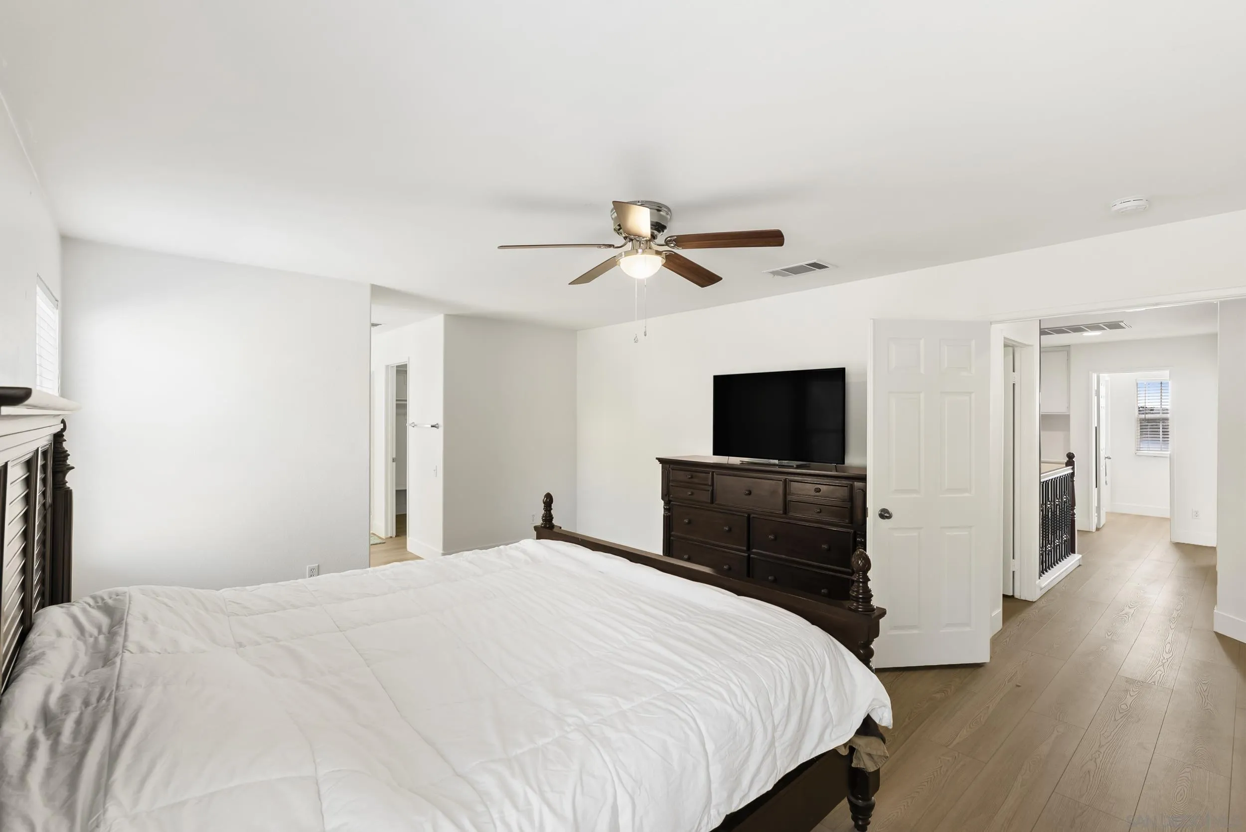 1405 Carneros Valley Street Chula Vista, CA 91913 - Photo 25 of 45 a bedroom with a bed and a flat screen tv