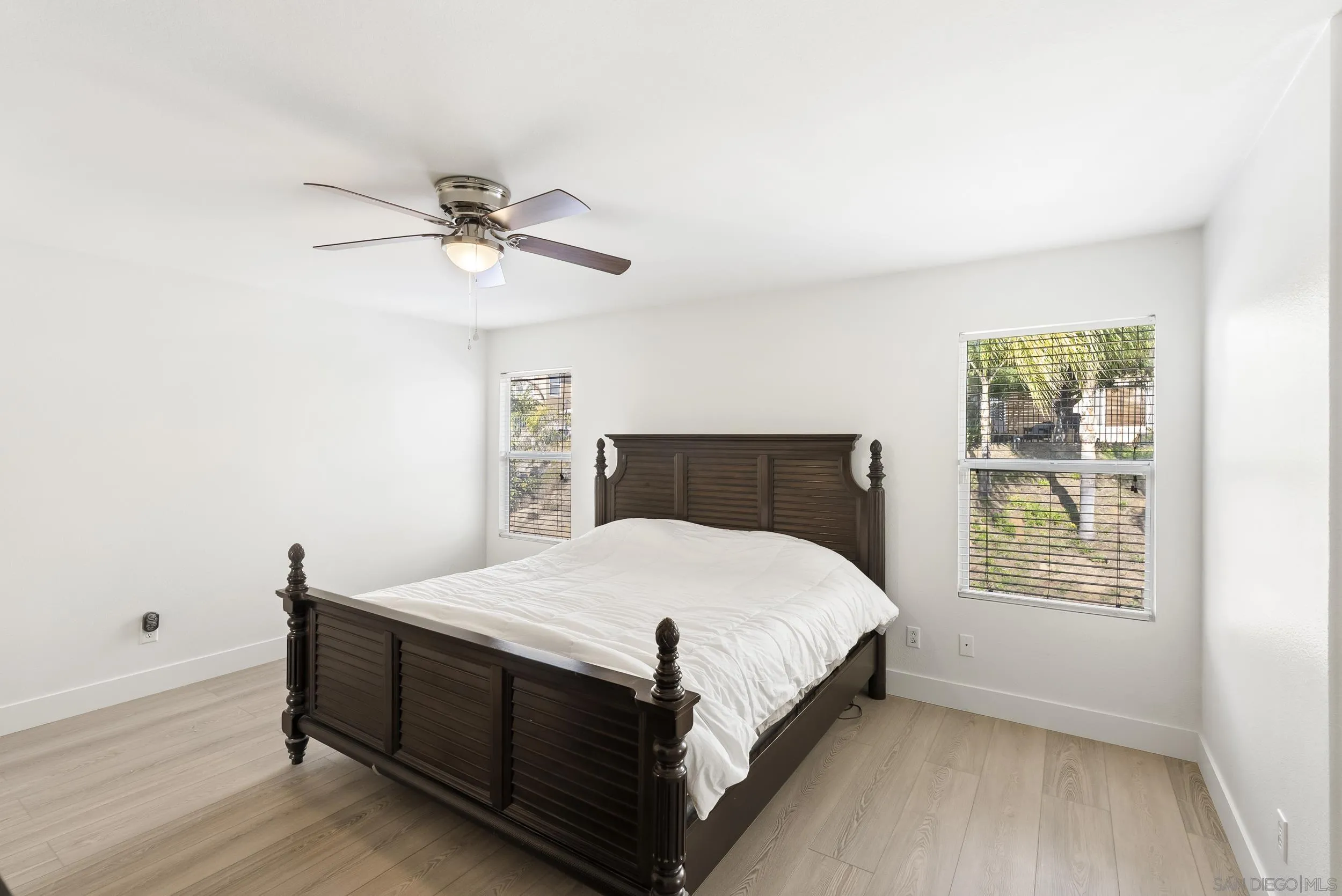 1405 Carneros Valley Street Chula Vista, CA 91913 - Photo 26 of 45 a bed sitting in a bedroom next to a window