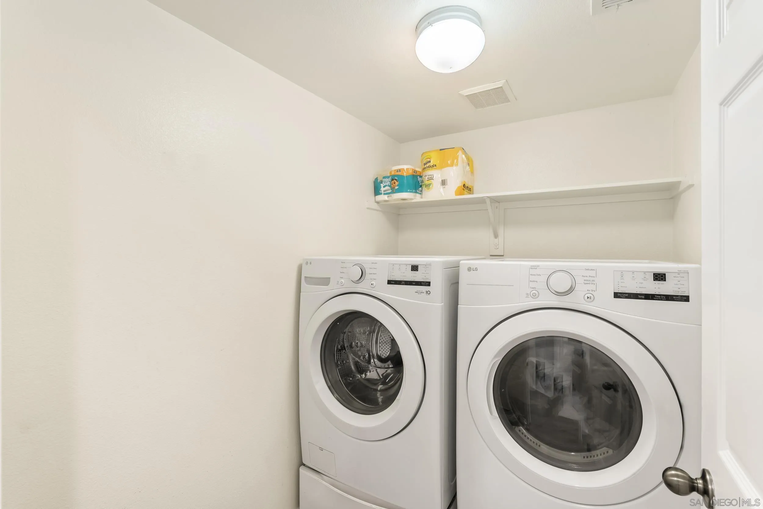 1405 Carneros Valley Street Chula Vista, CA 91913 - Photo 36 of 45 a utility room with dryer and washer
