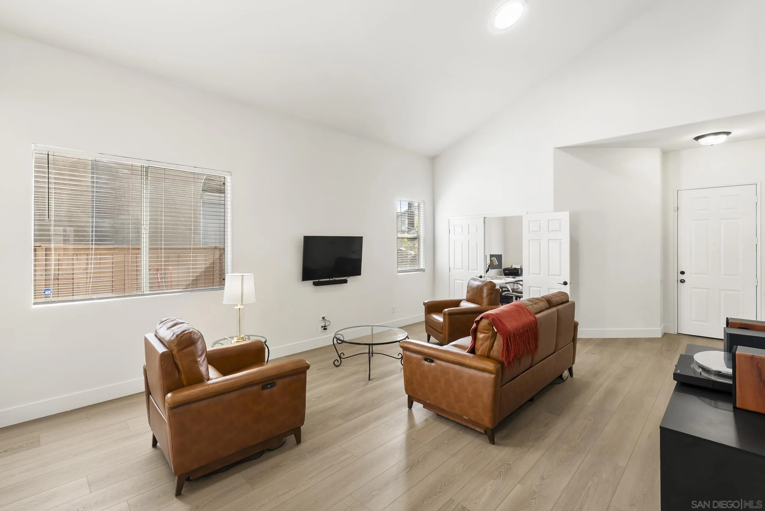 1405 Carneros Valley Street Chula Vista, CA 91913 - Photo 10 of 45 a living room with furniture and a flat screen tv
