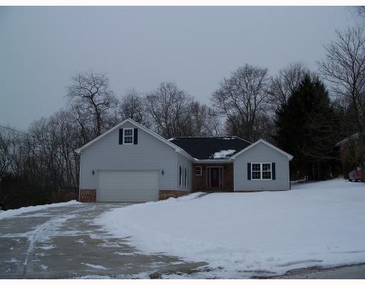 165 Lincoln Hall Road Elizabeth, PA 15037 - Photo 1 of 12 Exterior Front. Sprawling new brick to grade and vinyl sided ranch resting on 1.59 acres of land.Cement driveway and sidewalks Quality throughout!