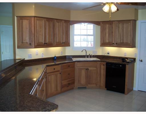165 Lincoln Hall Road Elizabeth, PA 15037 - Photo 5 of 12 Kitchen. 14 x13 cheery, fully equipped kitchen with beautiful Hickory cabinets and top of the line appliances. Instant Hot water.