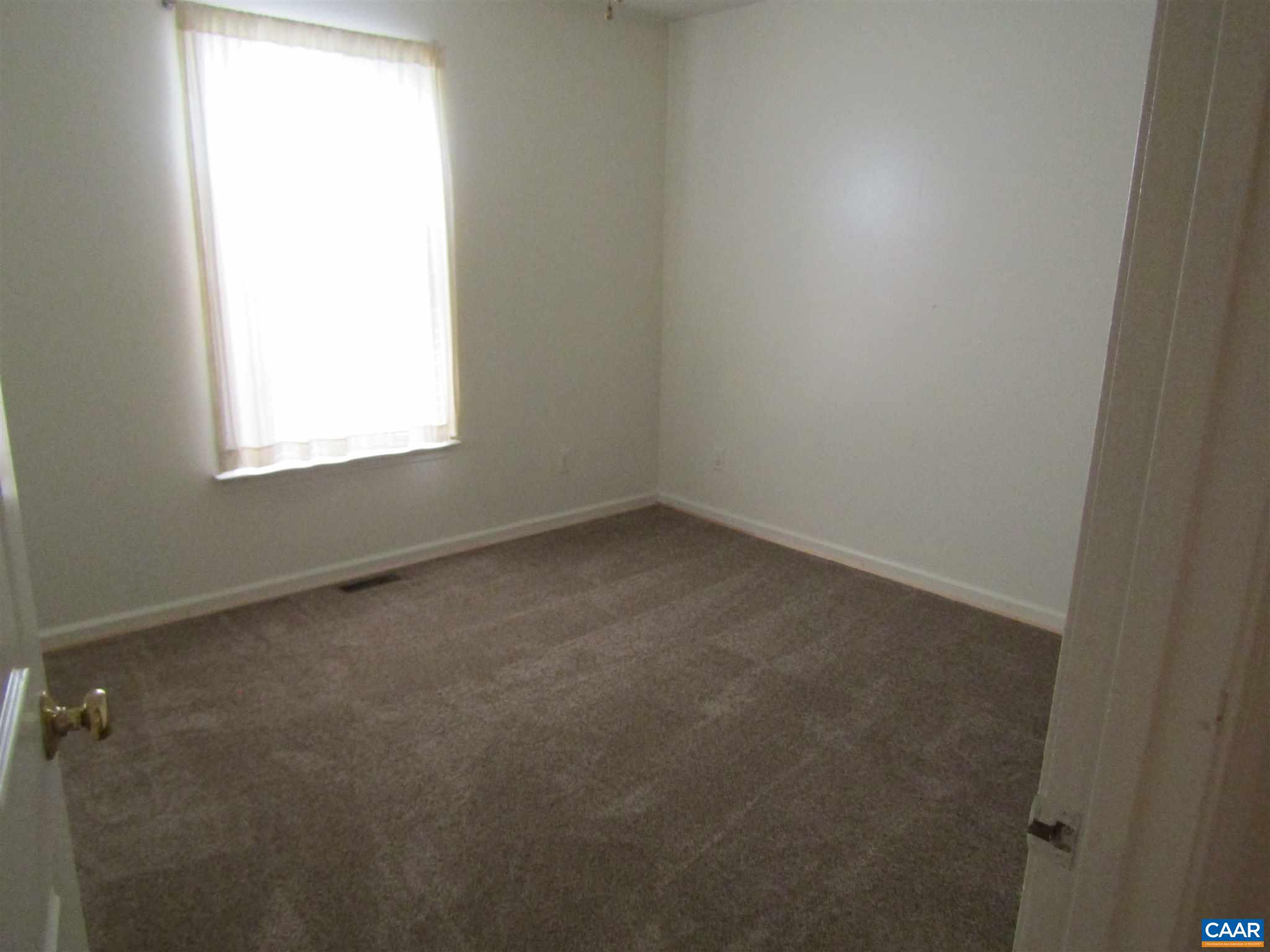 57 Riverside Drive Palmyra, VA 22963 - Photo 3 of 10 an empty room with a window
