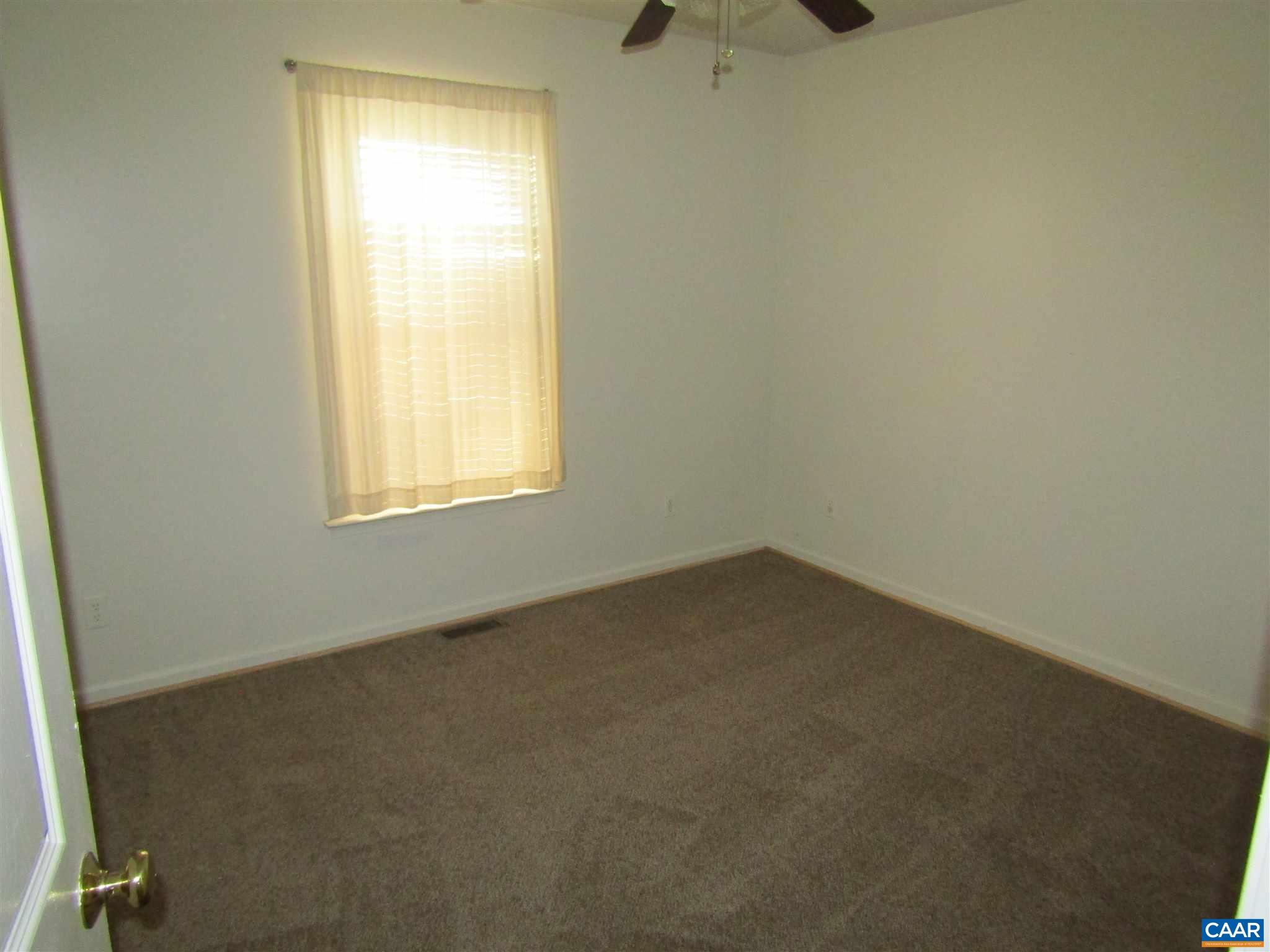 57 Riverside Drive Palmyra, VA 22963 - Photo 4 of 10 an empty room with a window