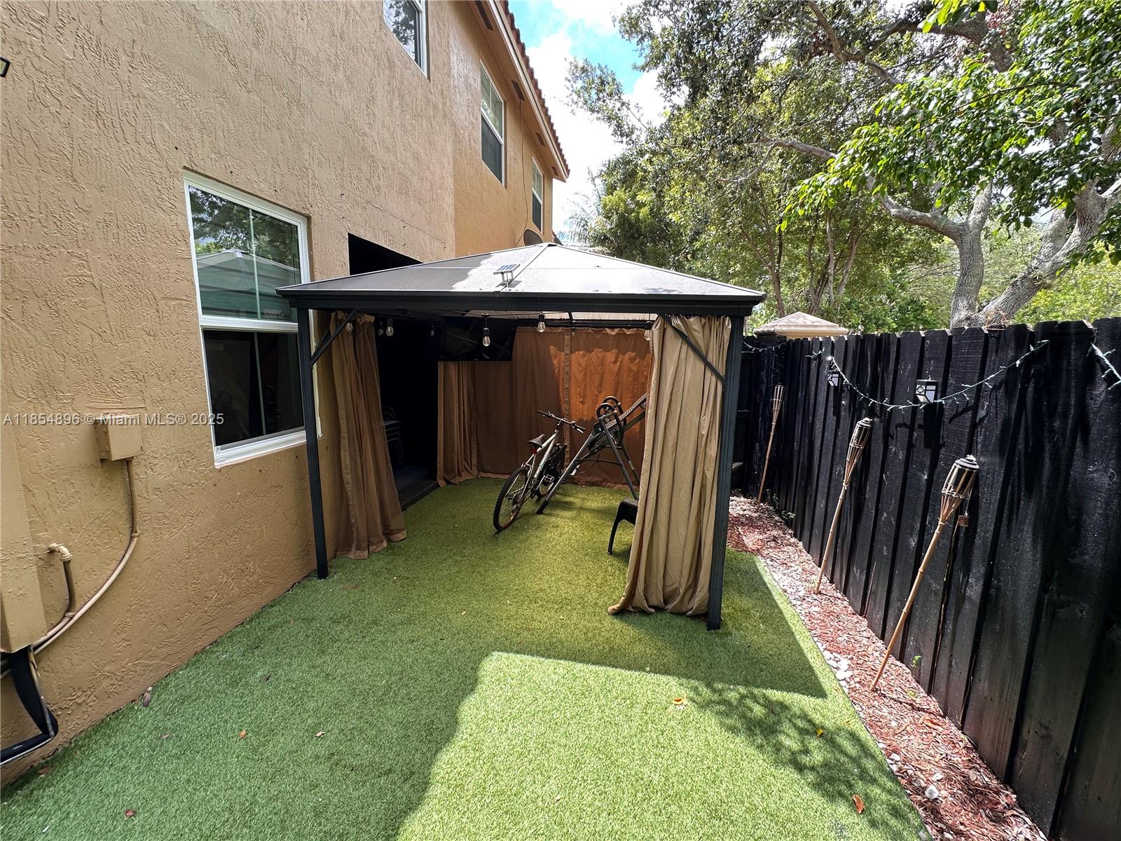 8908 Southwest 109th Avenue Miami, FL 33176 - Photo 15 of 28 a view of outdoor space and deck