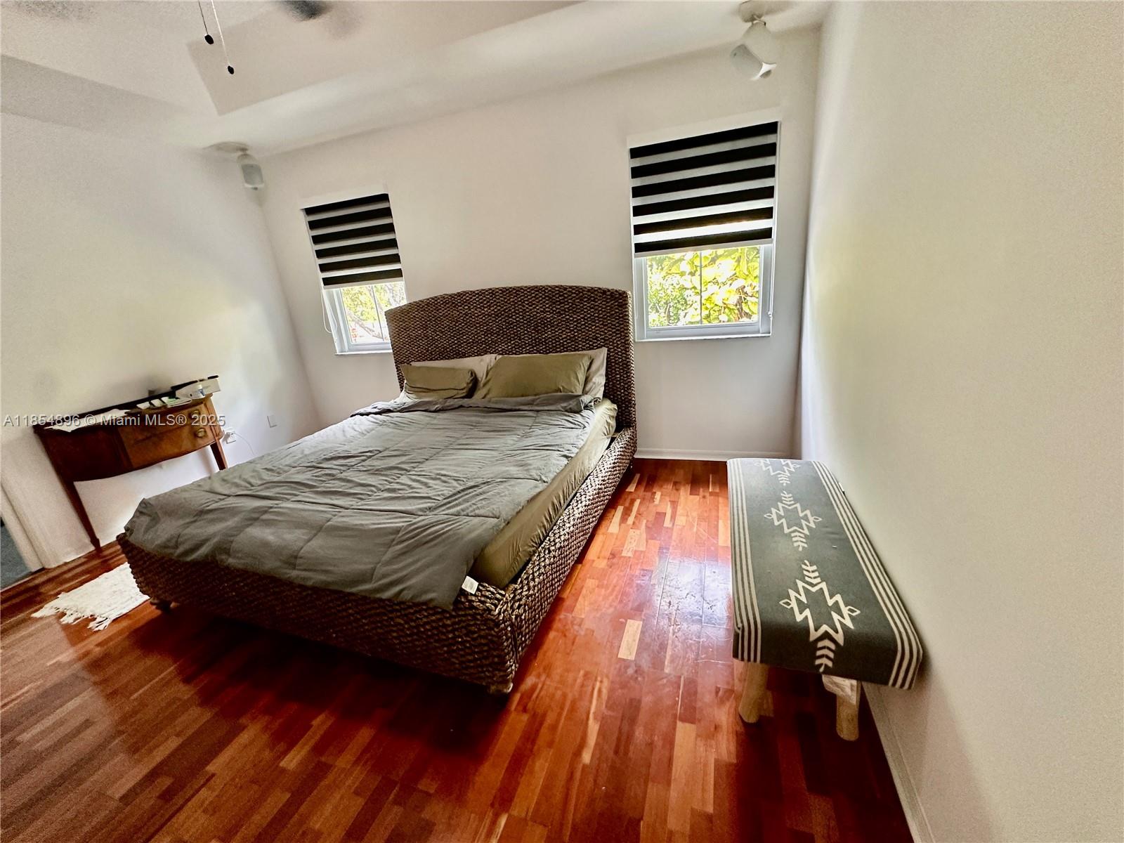 8908 Southwest 109th Avenue Miami, FL 33176 - Photo 19 of 28 a bedroom with a bed and a window