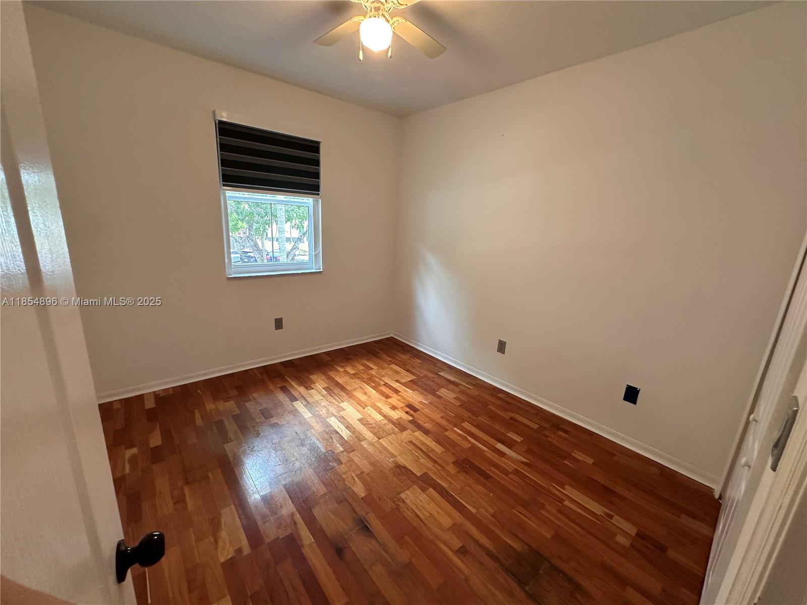 8908 Southwest 109th Avenue Miami, FL 33176 - Photo 22 of 28 an empty room with a window