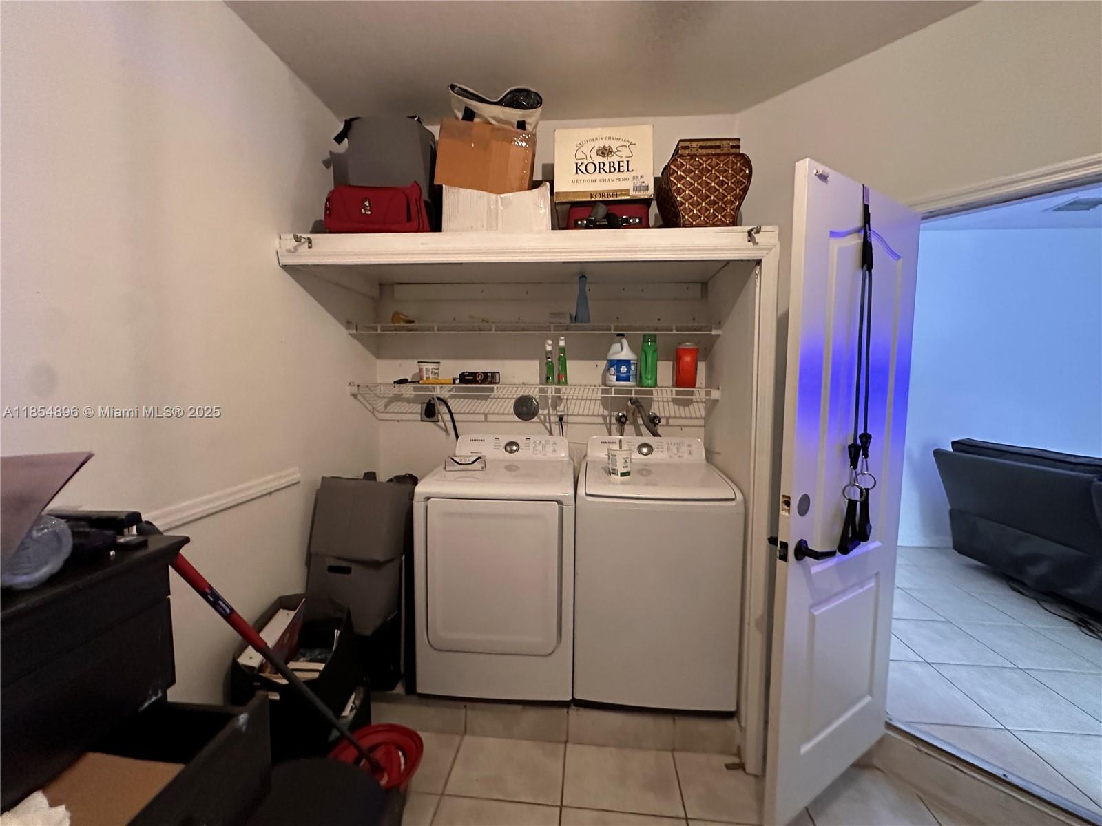 8908 Southwest 109th Avenue Miami, FL 33176 - Photo 27 of 28 a utility room with dryer and washer