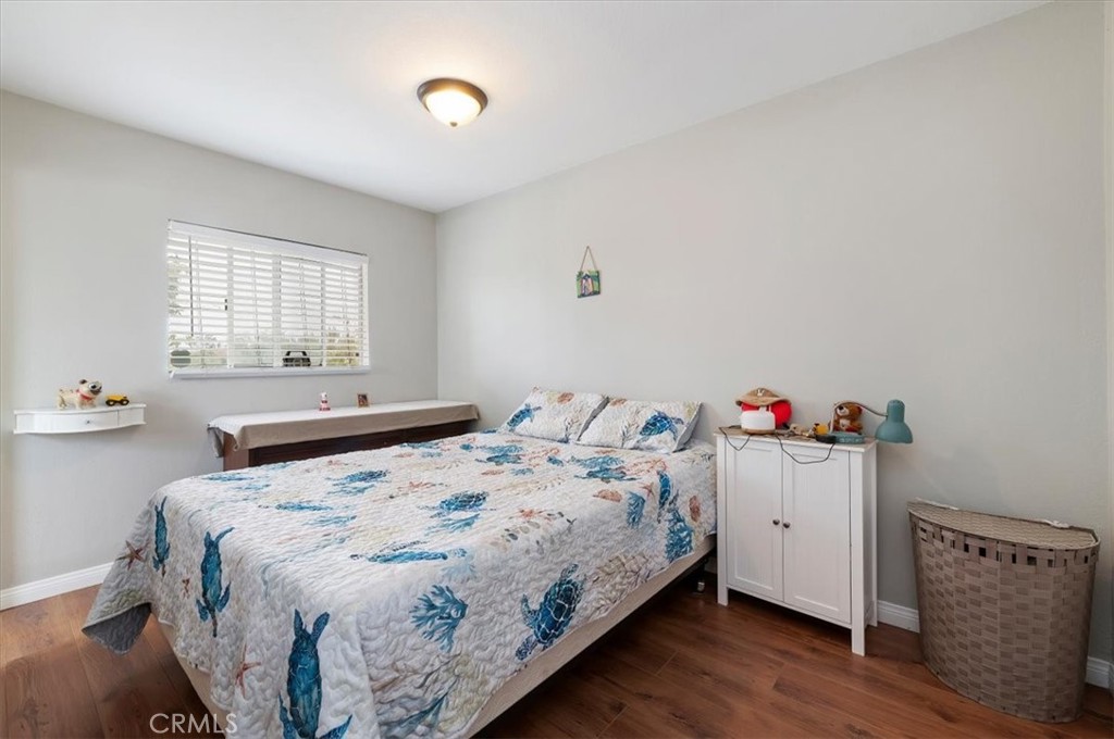 16420 Rocky Glen Road Perris, CA 92570 - Photo 64 of 74 a bedroom with a bed and window