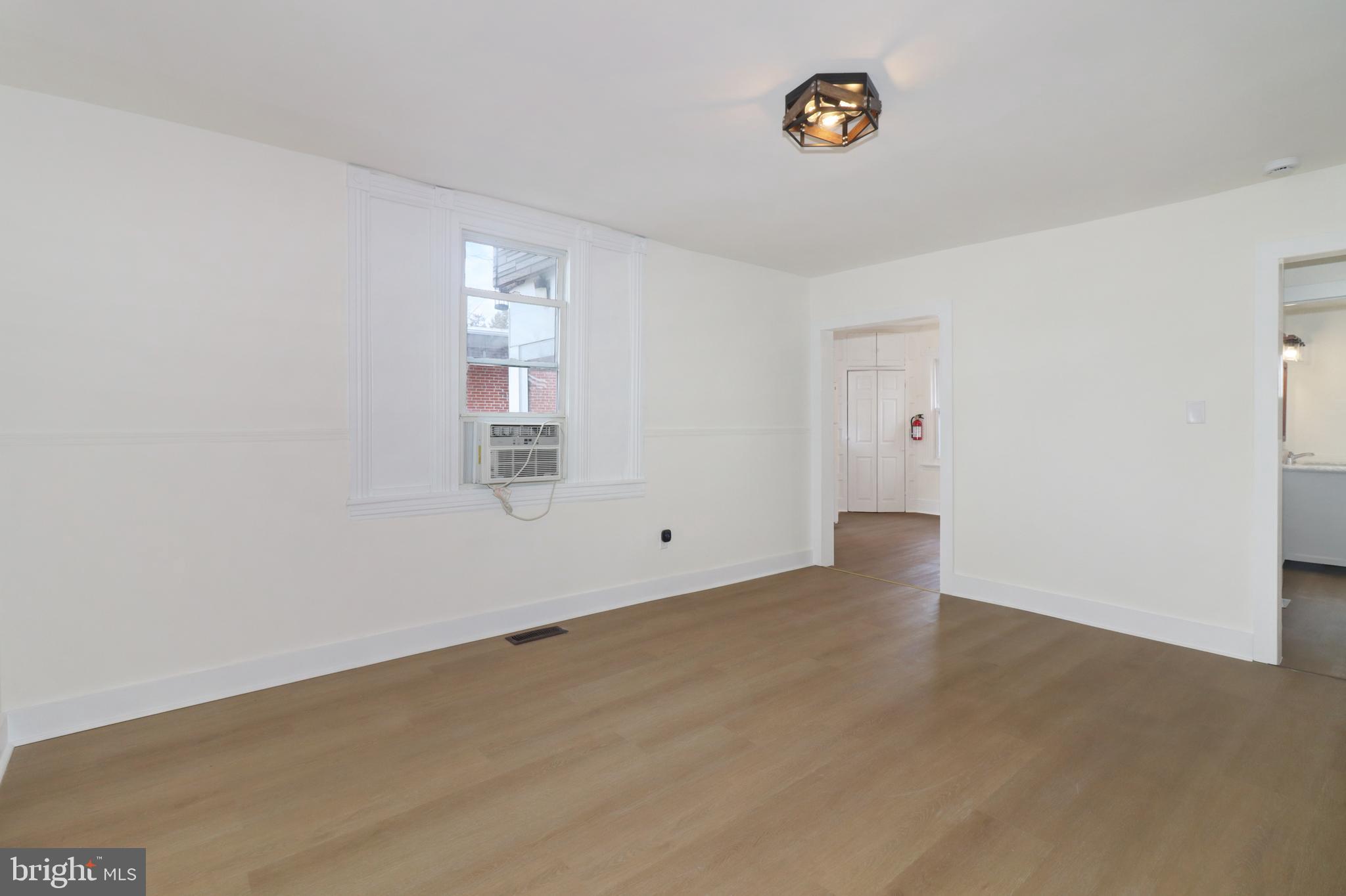 24369 West Main Street, Unit A Columbus, NJ 08022 - Photo 17 of 69 an empty room with windows