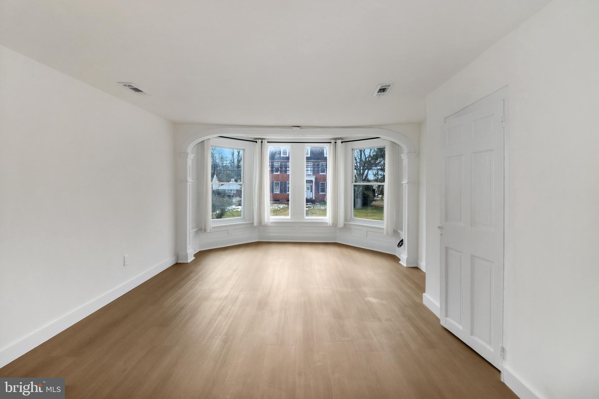 24369 West Main Street, Unit A Columbus, NJ 08022 - Photo 32 of 69 wooden floor in an empty room with a window